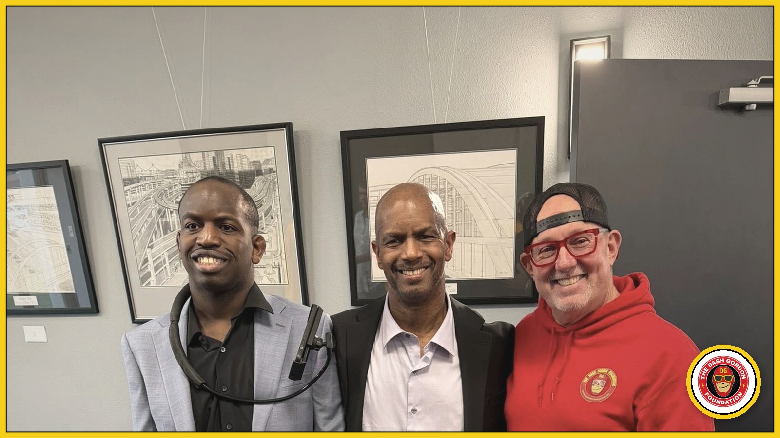 Adam Cline at his art gallery with Dash Gordon Foundation founder Tim Glover