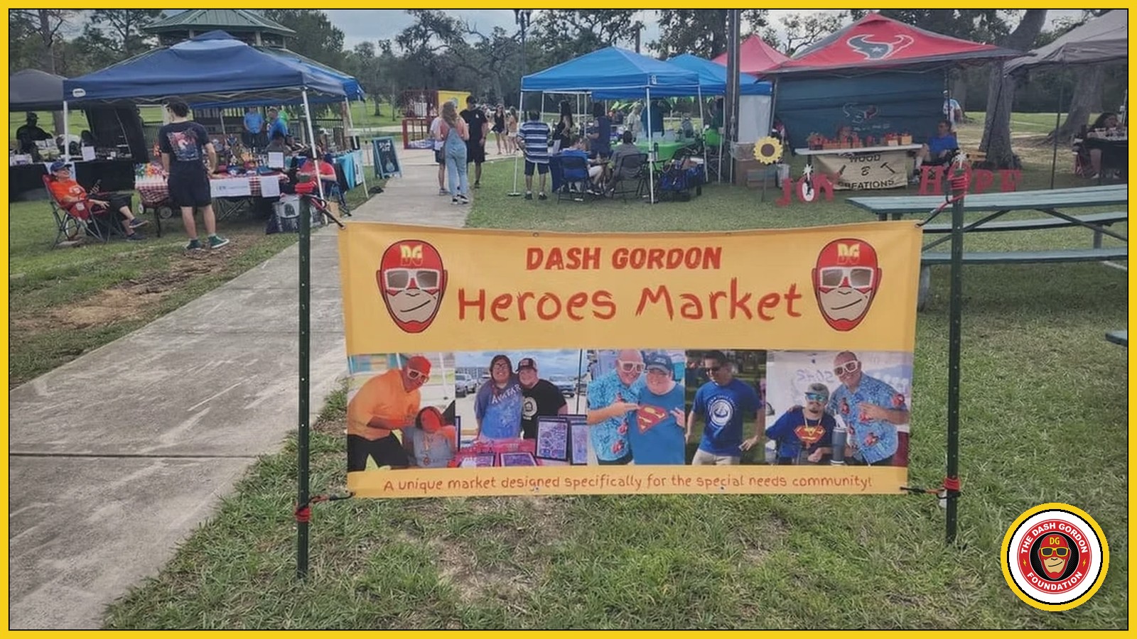 The Dash Gordon Heroes Market banner and vendor tents at a past event